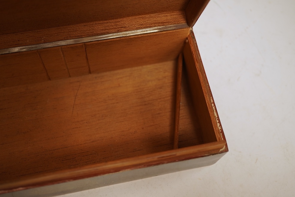 A George V rectangular plain silver cigarette box, Walker & Hall, Sheffield, 1929, 17.9cm.